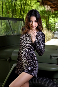 Oriental babe Malene with Willys Jeep