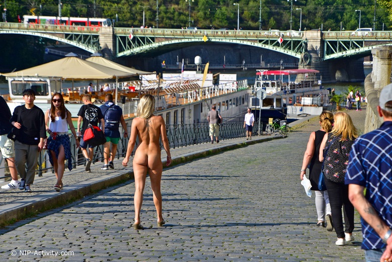 Bianca walking naked at river