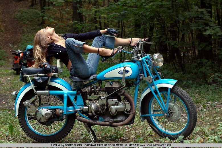Lizel posing in her motorbike