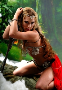 Amazon babe posing with two swords