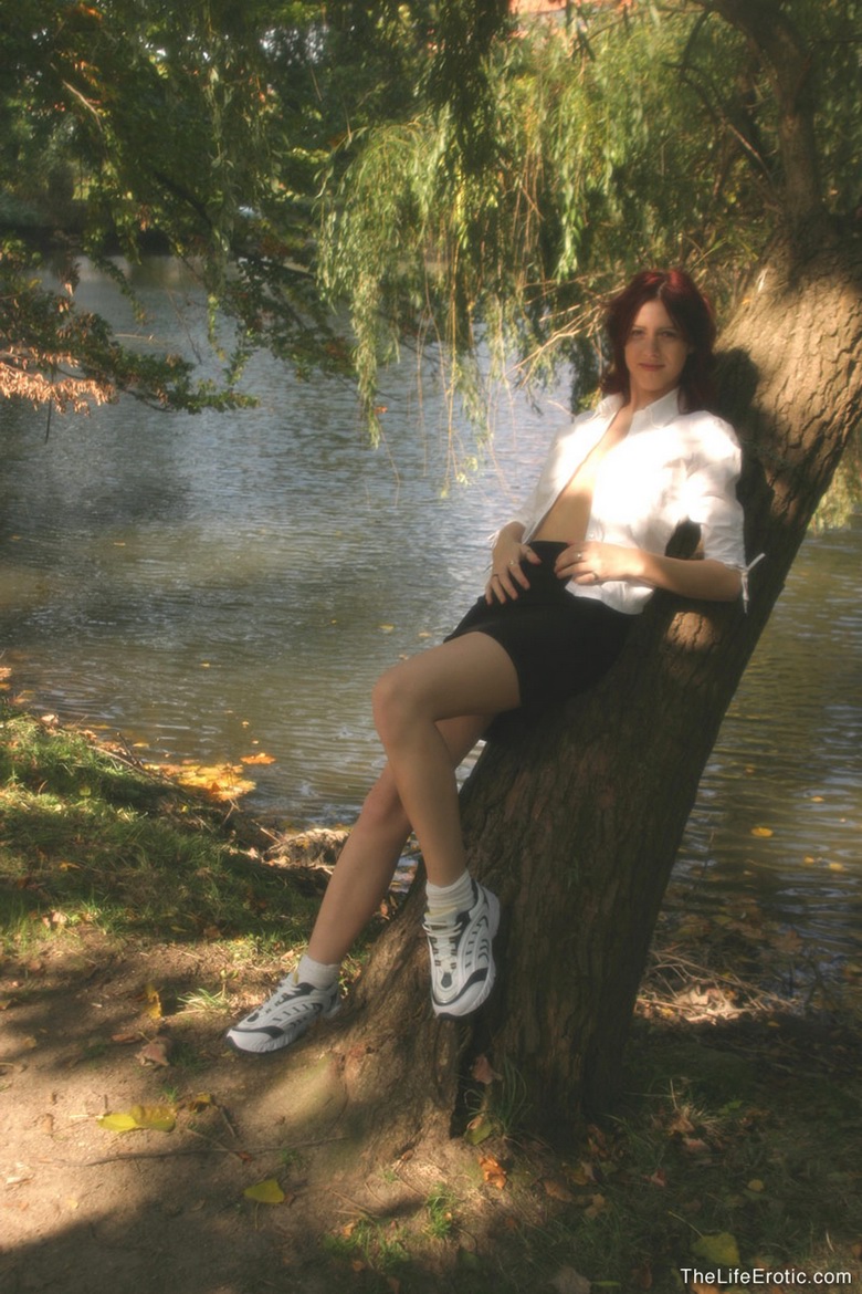 Kathi	gets naked outdoors
