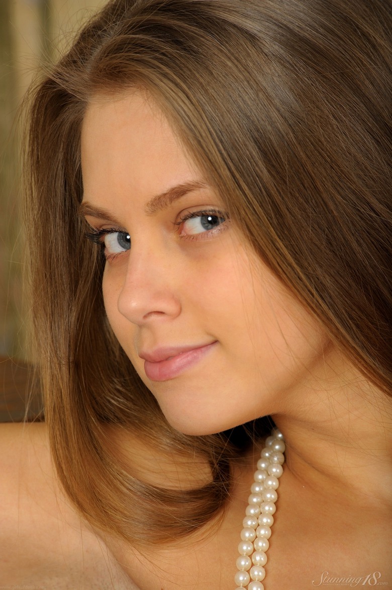 Young Kristel bends over