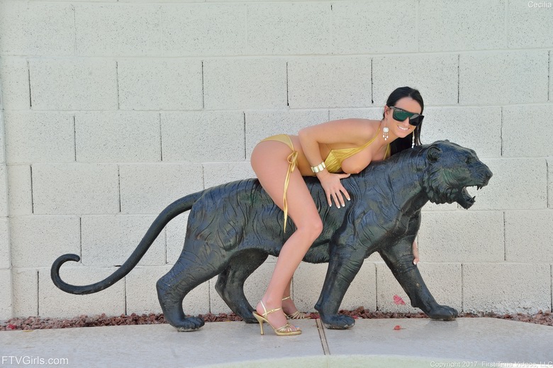 Cecilia pulls down yellow bikini