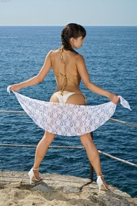 Jenna Sativa drops bikini on the shore