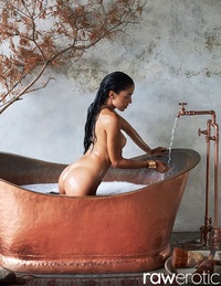 Natalia Bruni pulls down party dress