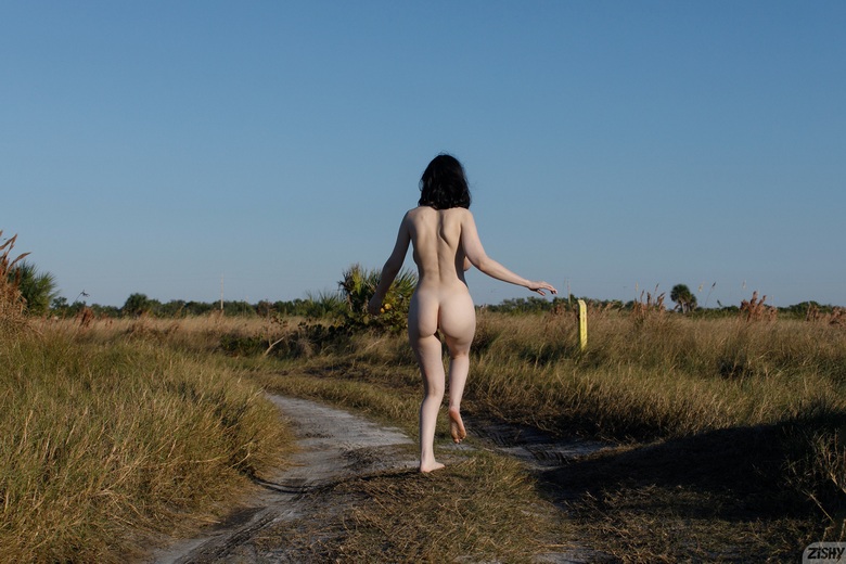 Giulia Wylde Walking On Beach